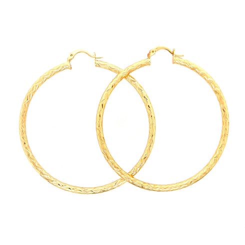 Explore the charm of our Huge Zigzag Texturized Hoops Earrings, crafted from 14k gold-filled material and showcasing intricate braided designs that stand out. These statement hoops are ideal for any occasion, effortlessly combining elegance with attention-grabbing style.
